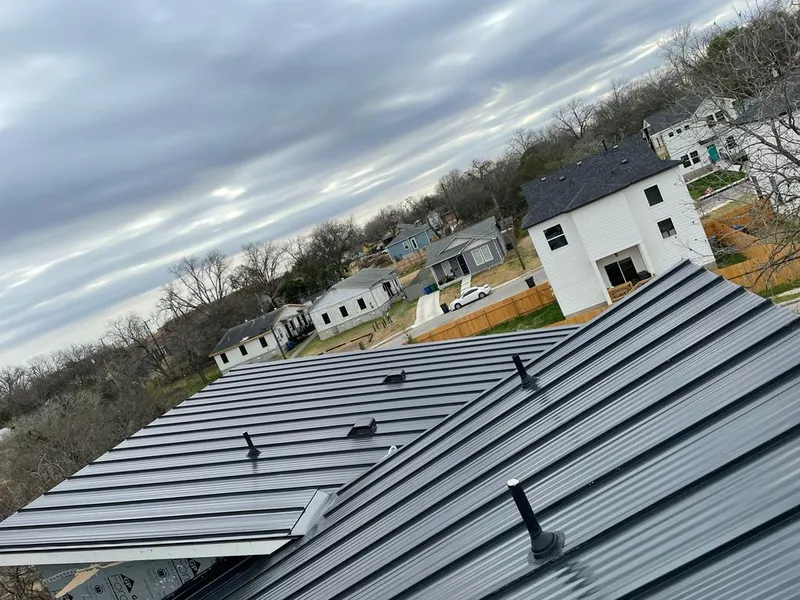 Standing seam metal roof panels with vents for Skylight Repair in Ellicott